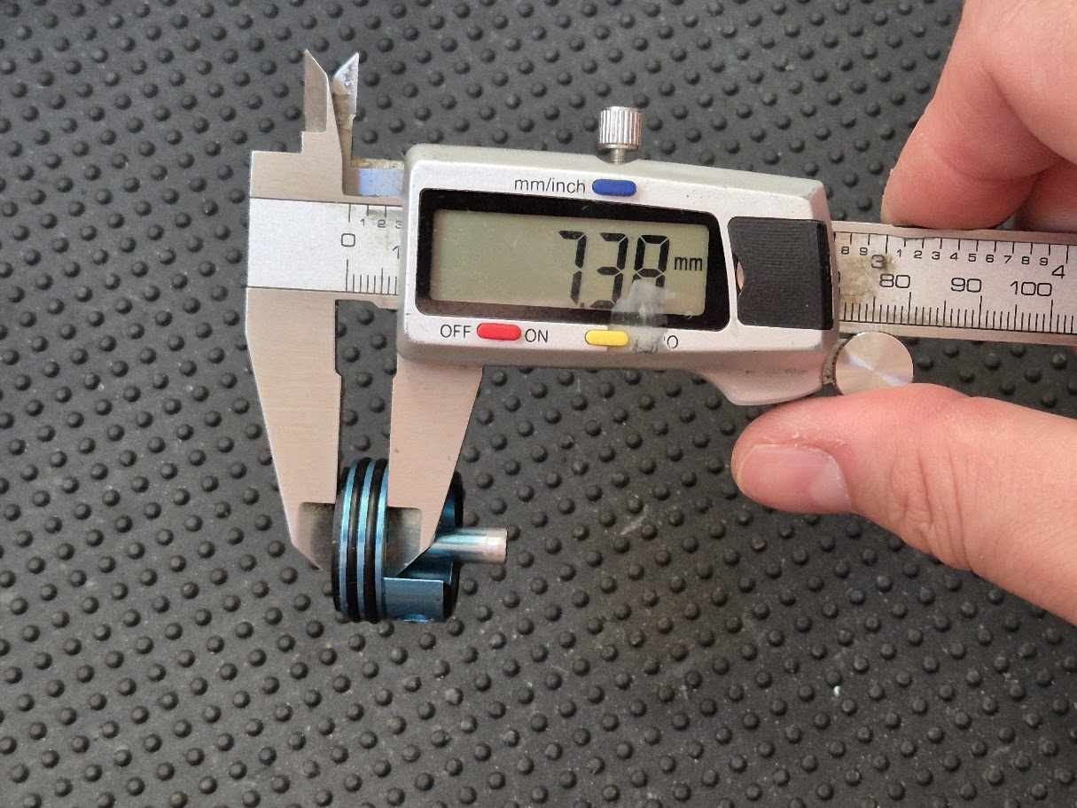 Measuring the total cylinder head thickness with the sorbo pad using calipers: 7.38 mm