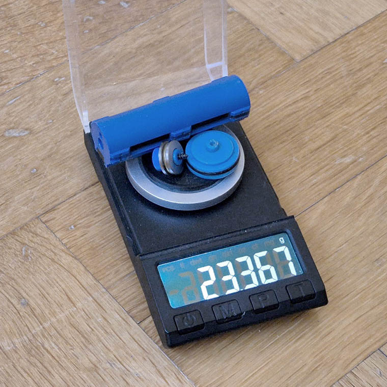 Weighing the complete piston assembly on a precision scale: 23.367 g